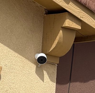 Installed exterior camera under an eave